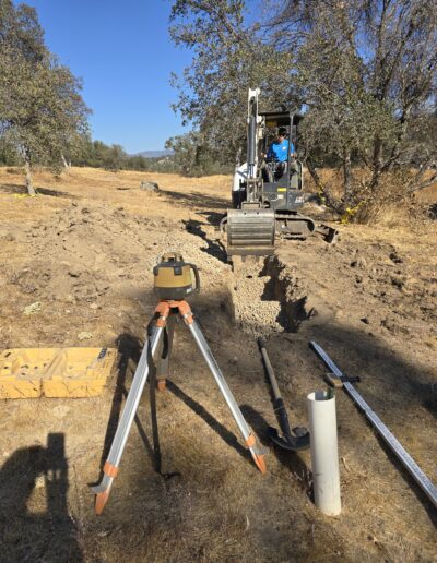 Advanced root remediation process, showing equipment used to remove deep-rooted plants from pipes or septic systems